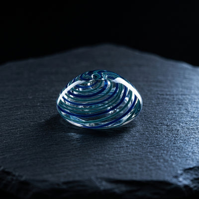 Editorial product photography on charcoal slate