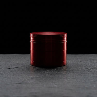 Editorial product photography on charcoal slate
