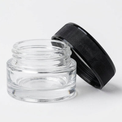9ml child resistant glass jar with black ribbed lid on white background