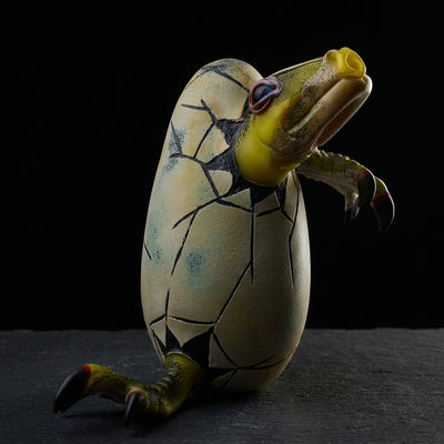 Kid Dino Hatchling Dino Egg - Yellow on dark slate surface - Oil Slick Pad