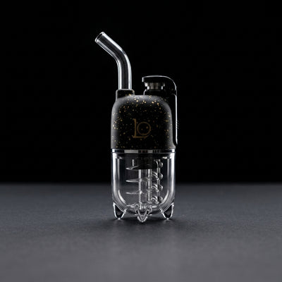 LOOKAH Dragon Egg Splatter (950mAh) on dark slate surface - Oil Slick Pad
