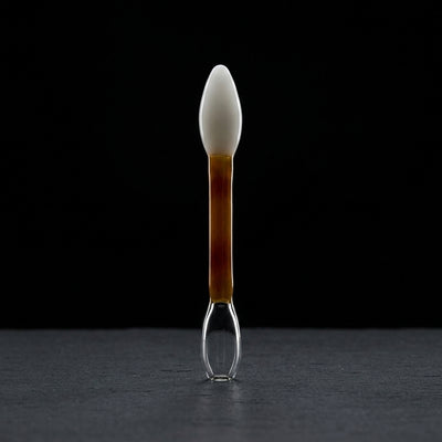 Mateo Gonzalez Glass Q Tip Pillar on dark slate surface - Oil Slick Pad