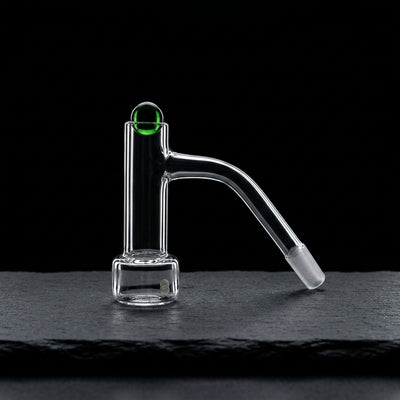 Only Quartz Hollow Foot Auto Spinner Banger - 10 M 45° on dark slate surface - Oil Slick Pad