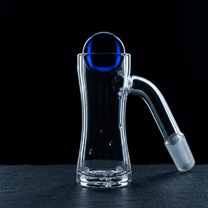 Only Quartz Hourglass Auto Spinner Banger - 10 M 45° on dark slate surface - Oil Slick Pad