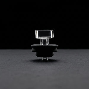 Puffco Peak Pro Black Ball Cap on dark slate surface - Oil Slick Pad