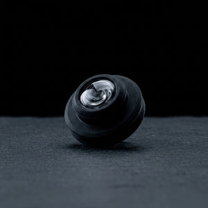 Puffco Peak Pro Oculus Carb Cap on dark slate surface - Oil Slick Pad