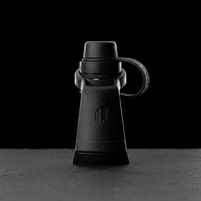 Puffco Peak Travel Pack - Black on dark slate surface - Oil Slick Pad