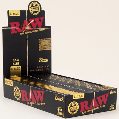 RAW Black Classic 1 ¼ Rolling Papers 24bx, light background