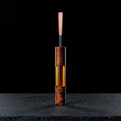 Round Sesh Sceptor DAB Tool V2 – Amber on dark slate surface - Oil Slick Pad
