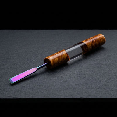 Round Sesh Sceptor DAB Tool V2 – Clear on dark slate surface - Oil Slick Pad