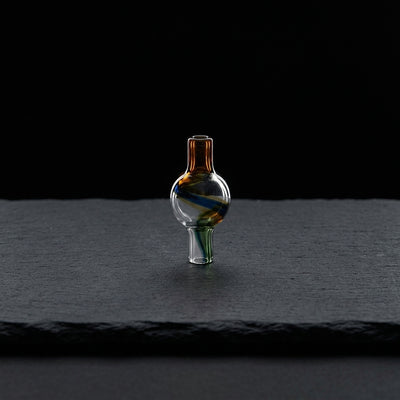 2″ Full Color Simple Bubble Carb Cap on dark slate surface - Oil Slick Pad