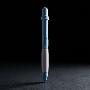 Smyle Penjamin 510 Battery Writing Pen on dark slate surface - Oil Slick Pad