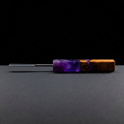 Square Sesh Sceptor Dab Tool on dark slate surface - Oil Slick Pad
