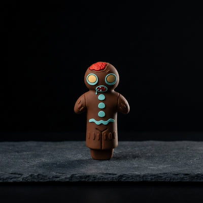 The Gingerbread Man hand pipe on dark slate surface - Oil Slick Pad
