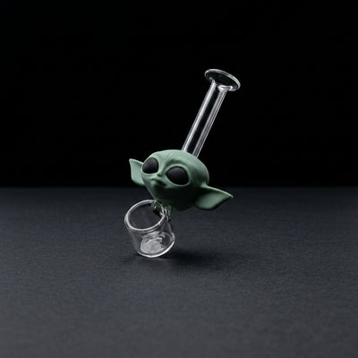 Wise Green Elder Glass Hand Pipe on dark slate surface - Oil Slick Pad