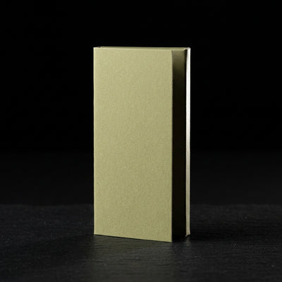Zig Zag 1 ¼ Organic Hemp Papers on dark slate surface - Oil Slick Pad
