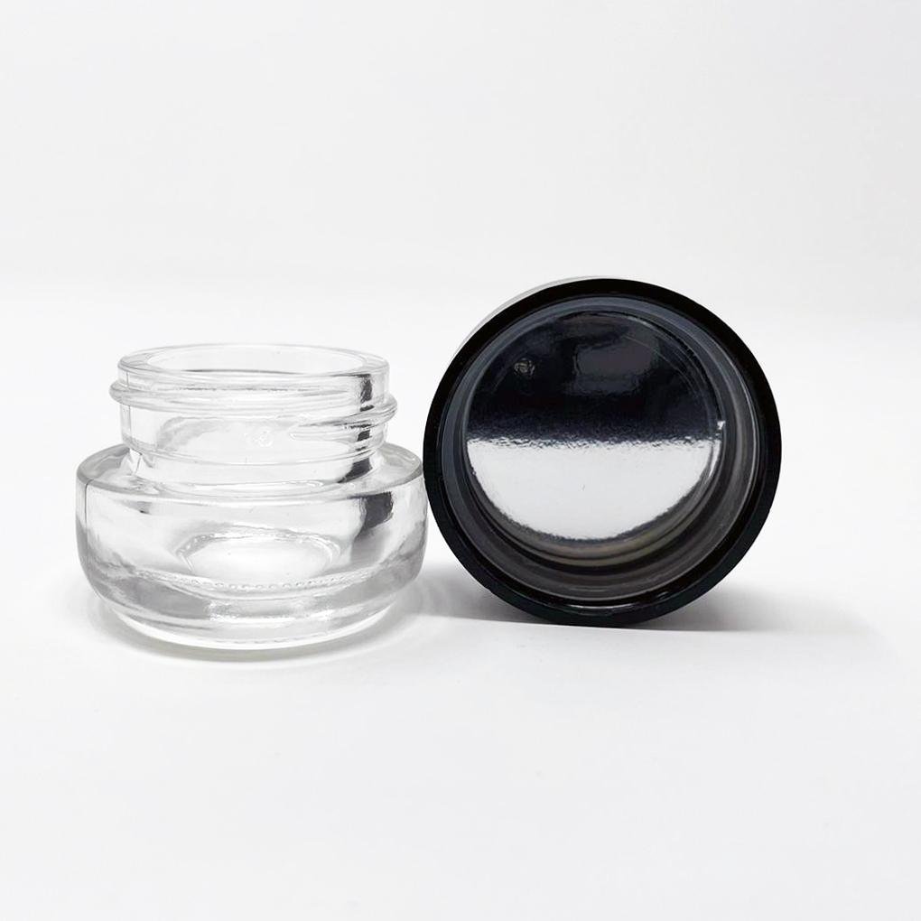 https://oilslickpad.com/cdn/shop/products/5ml-round-bottom-child-resistant-jar-with-black-lids-193477_2000x.jpg?v=1684975452